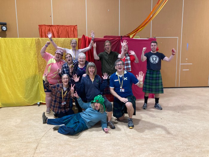 Staff getting ready for the kilt walk